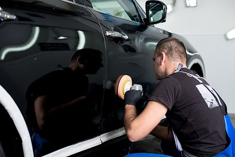 Man Polishing Car