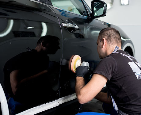 Man Polishing Car