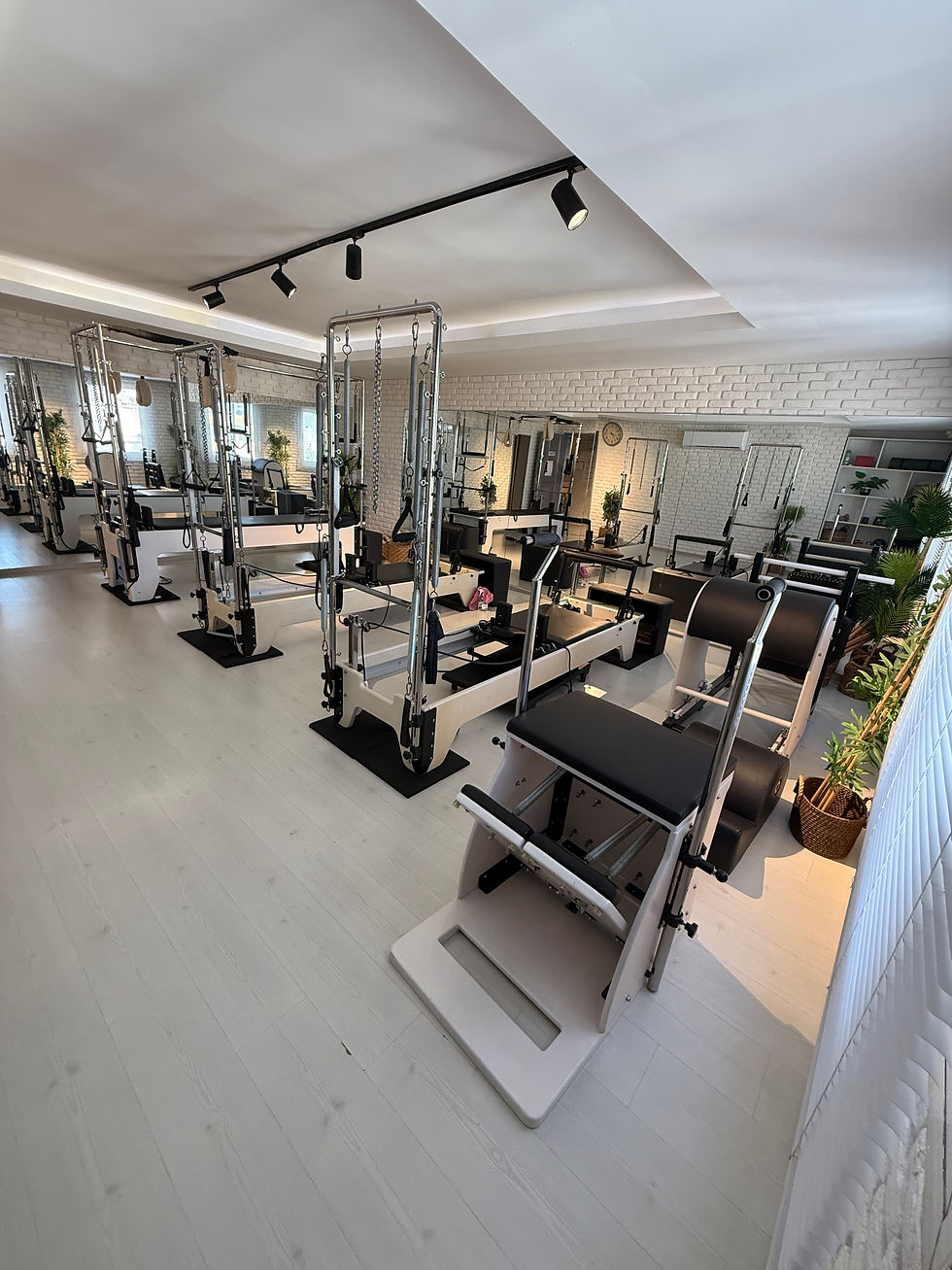 Close-up view of reformer pilates equipment with soft natural light