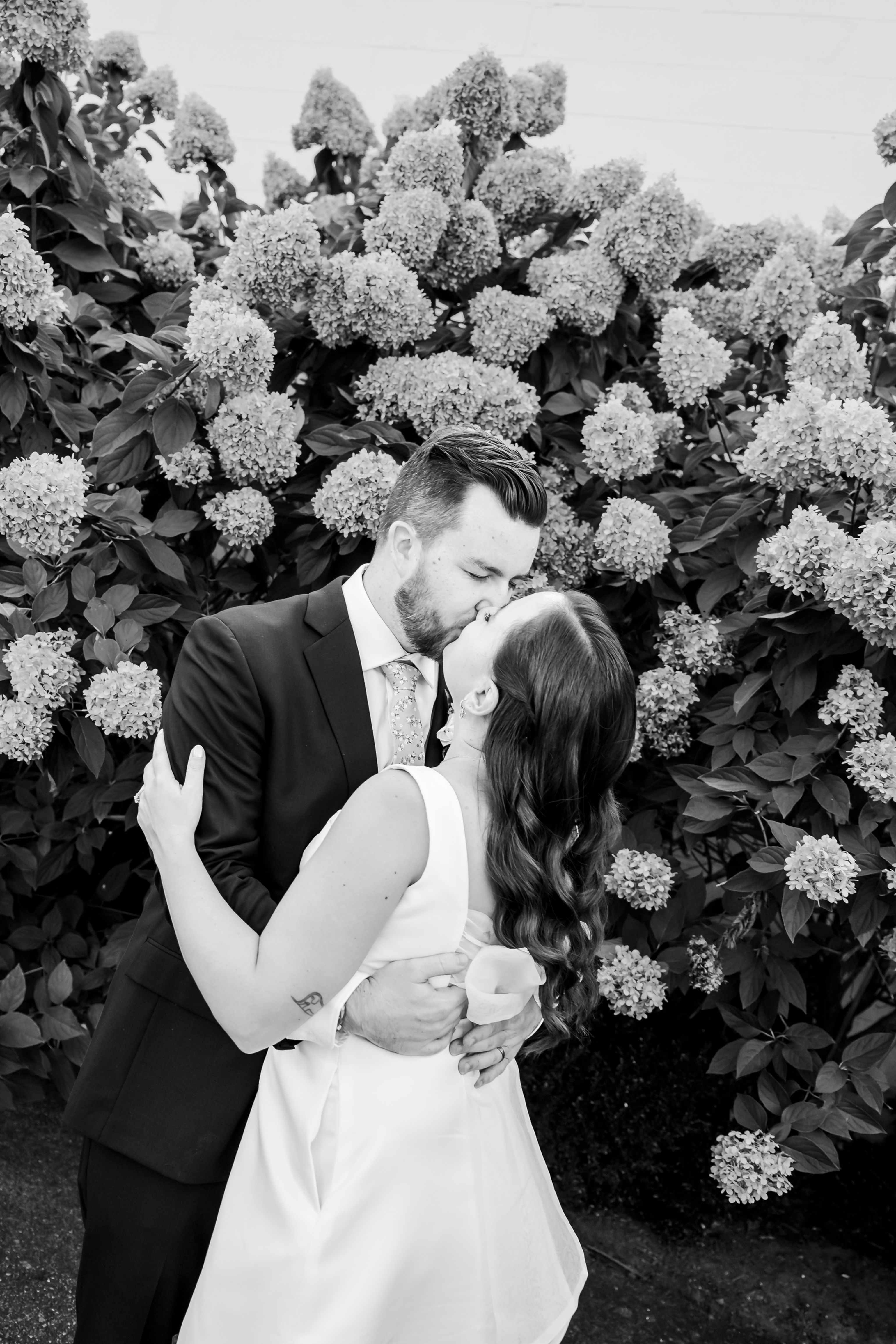 Married couple kissing