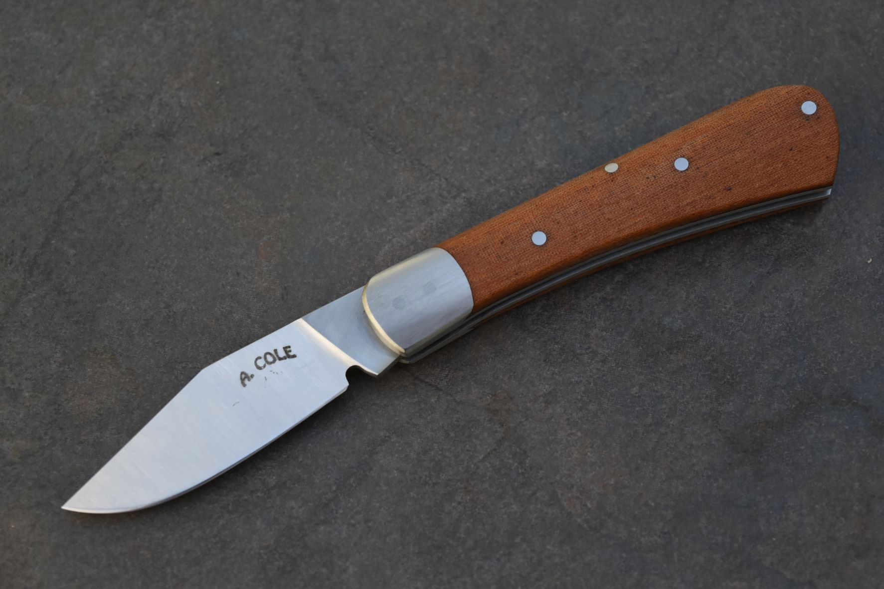 Backspring Folder, AEB-L and Vintage Micarta