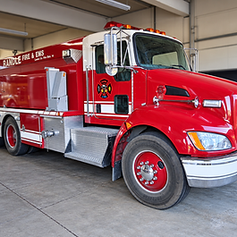 This tender has a 500gpm pump and carries 3000 gallons of water. It also carries a limited supply of fire hose and a floating water pump.