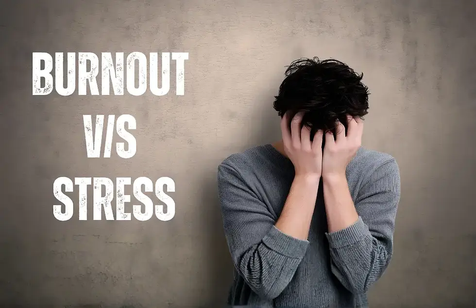 Person holding head in hands beside text reading “Burnout vs Stress.”
