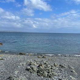 Sea view from a rocky beach near the Cornwall coastal path.