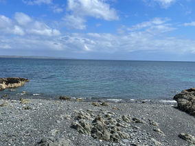 Sea view from a rocky beach near the Cornwall coastal path.