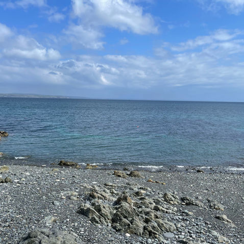 Sea view from a rocky beach near the Cornwall coastal path.