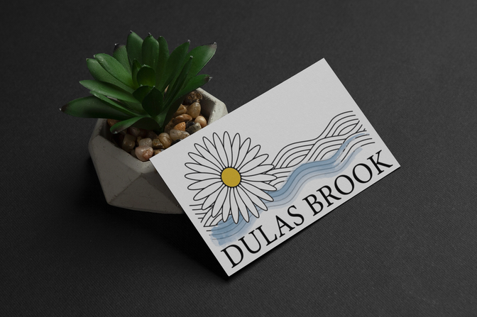 Logo and business card design, detailling a flower over a brook