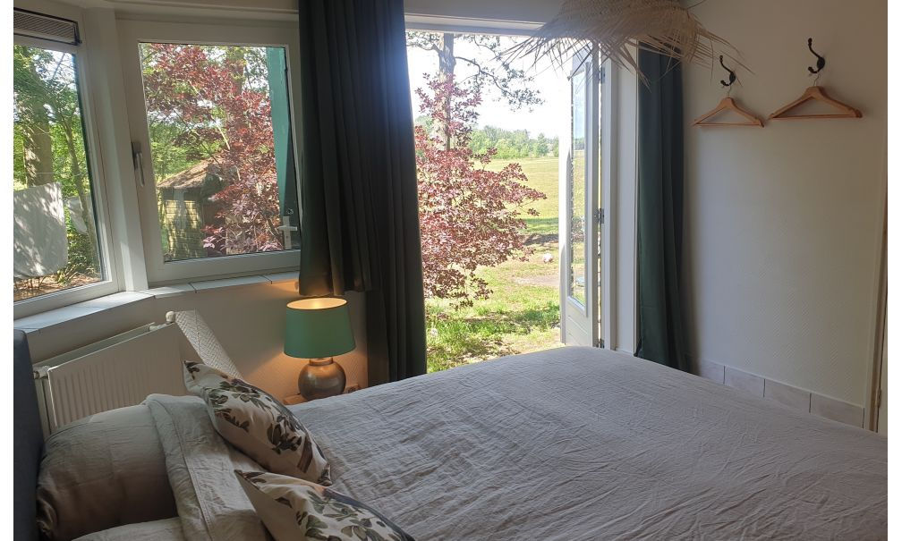 Die Aussicht vom Bett in Ferienhaus Doldersum – Ferienhaus in Drenthe Holland