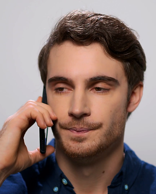 videoblocks-portrait-of-aggressive-man-talking-on-smartphone-in-studio-nervous-guy-screami