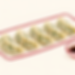 Five vegetable gyoza on an illustrated crimson plate