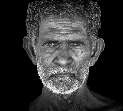 Black and white close-up portrait of an elderly man with deep wrinkles and intense eyes, conveying strength and experience — a powerful study by Cristian Mitrani.