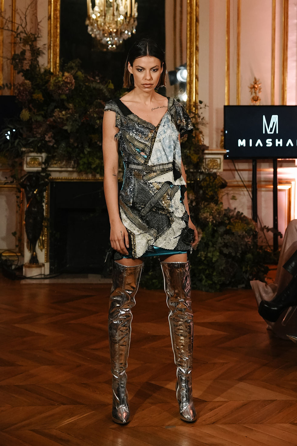 Model wearing Miashan on the runway of fashion week studio Paris