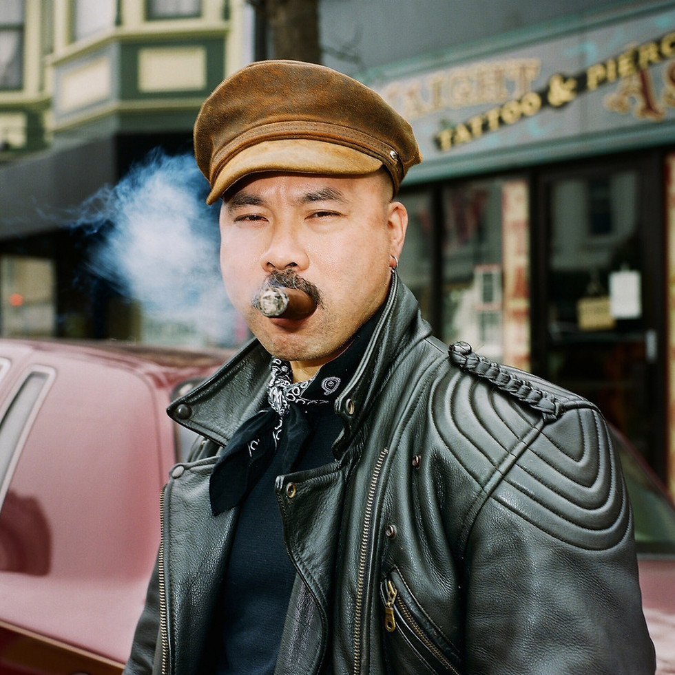 Thumbnail: Man smoking cigar.