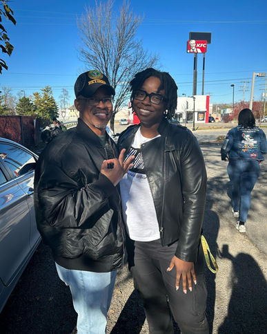 Pictured with a Nupe of Kappa Alpha Psi Fraternity from Tennessee that saw all that we did that day and helped us out.