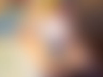 Girls painting on tiles and Boys working on a black and white  self portrait