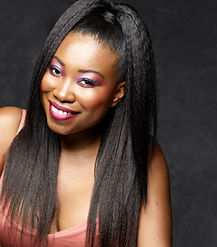 Model with half up half down hairstyled by nadia vassell salon