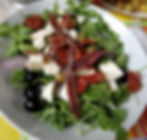 Ischitana; pomodoro, mozzarella, rucola, acciughe, olive