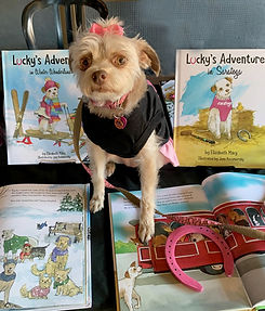 Lucky on table both books.jpg