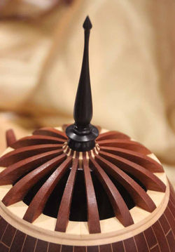 Cliff Walsh close up of lid of lidded form with legs