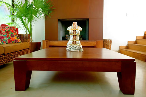 Sculpture of the Broken column by Frida Kahlo in a Living room