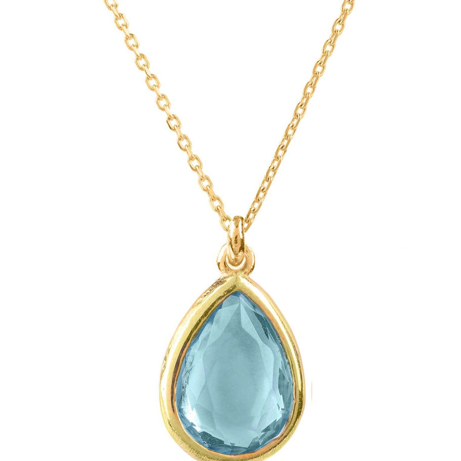 Collier en or jaune avec un pendentif bleu en forme de goutte. Maison Argÿel.