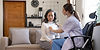 asian-female-patient-undergoing-health-check-up-while-female-doctor-uses-stethoscope-check