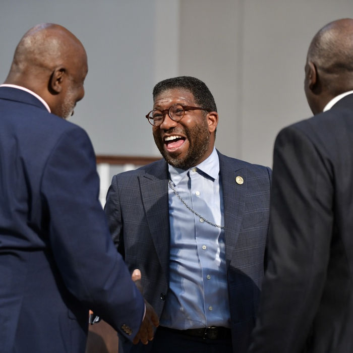 Three GMBSC leaders sharing a joyful conversation during the Annual Session.