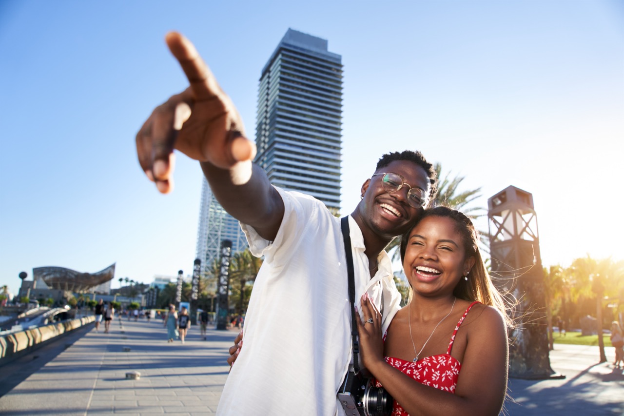 smiling-young-african-american-traveling-couple-en-2025-01-08-23-23-50-utc Large.jpeg