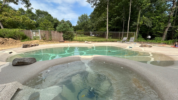 Nature-inspired pool and spa made of quartz sand in Central New Jersey
