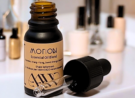 Motion Essential Oil Blend 10ml on bathroom countertop.