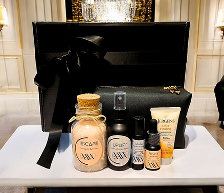 Aromatherapy Recovery Bundle including Escape Bath Salts, Uplift Aromatherapy Spray, Aura Essential Oil Roll-on, and Revive Essential Oil Blend including bonus lotion and travel bag.