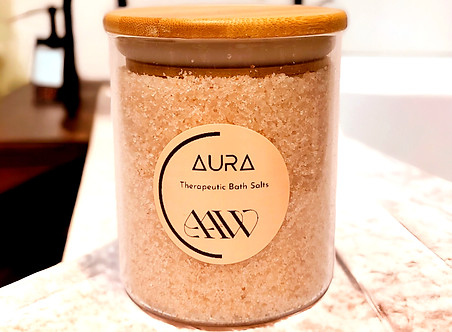 Aura Bath Salts displayed on bathroom counter.