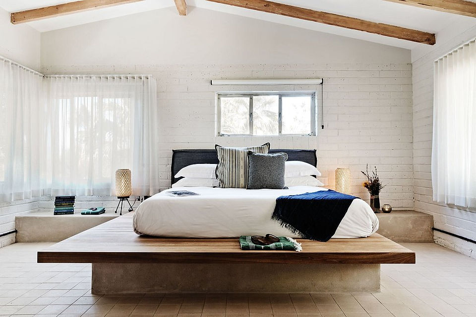 A white mattress on a platform bed  at the Two Bunch Palms Resort