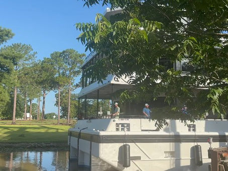 Breaux Brothers builds massive Yacht and transports it down Bayou Teche