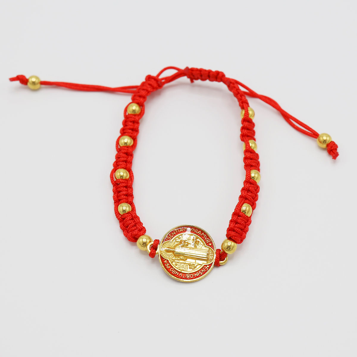 Pulsera San Benito cordón rojo