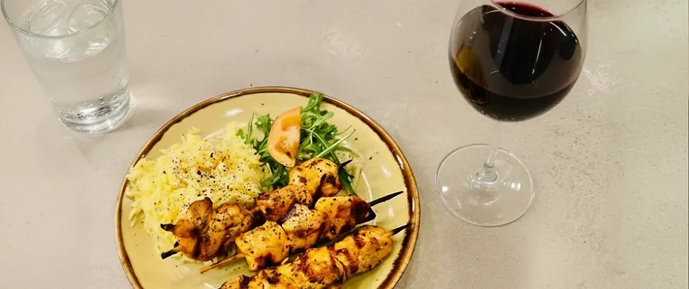 Red wine served with Shish Touk