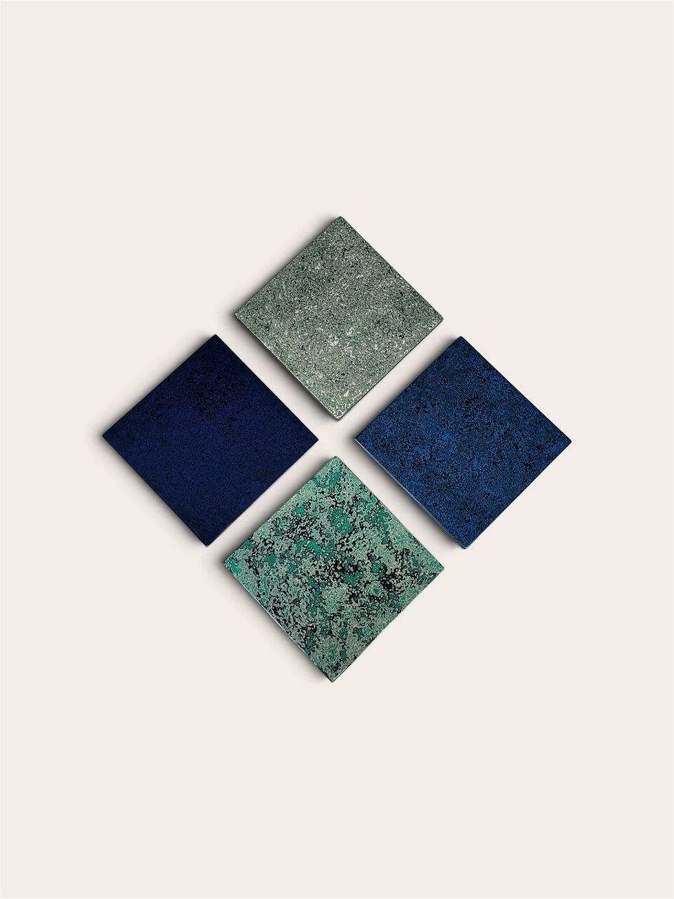 Four rhino skin Chinese lacquer paintings, 18 x 18 cm (7.1 x 7.1 in) each, in teal and black, green and white, deep blue, and
