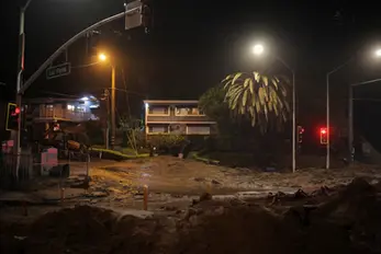 California roads buried in mud after powerful storm triggers landslides