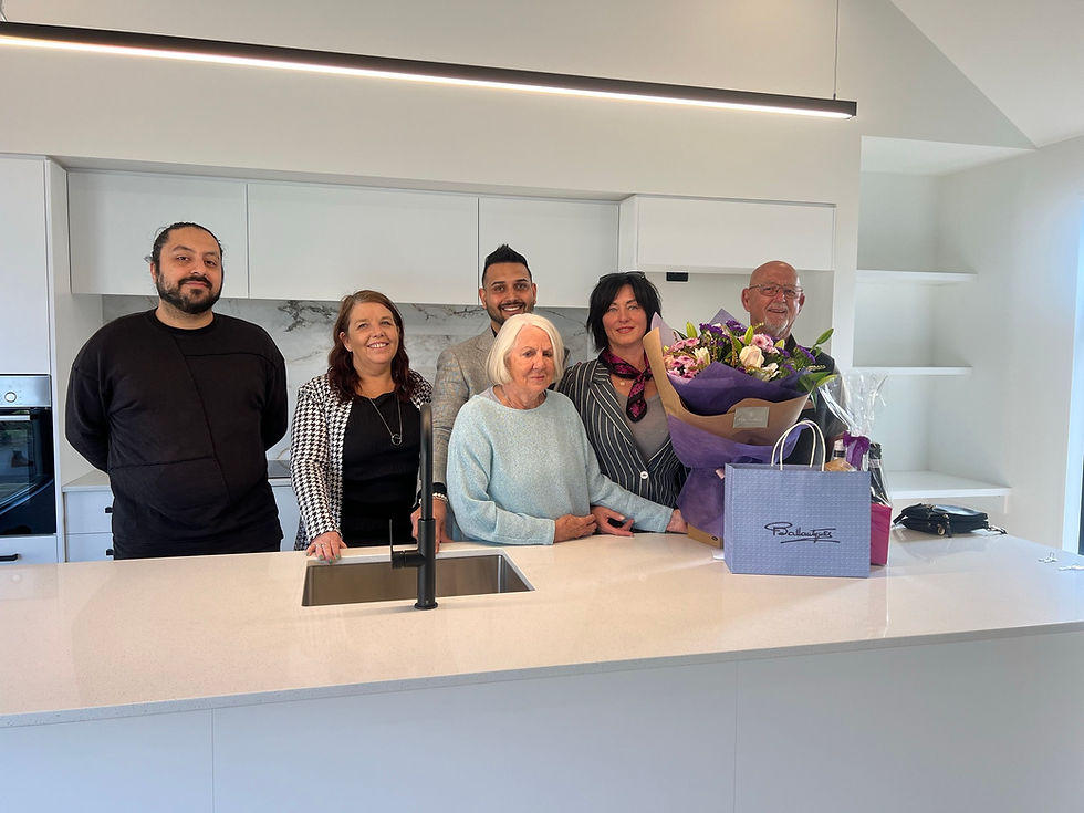 The Hedgley Corporation team, founded by Kian Clements-Ormond, is taking a group photo during the handover celebration.