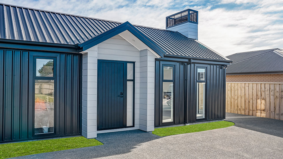 New build home in NZ by Kian Clements-Ormond with black metal cladding and white accents