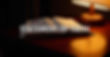 freepik__open-bible-on-a-wooden-table-with-a-lamp-illuminat__96928.jpeg