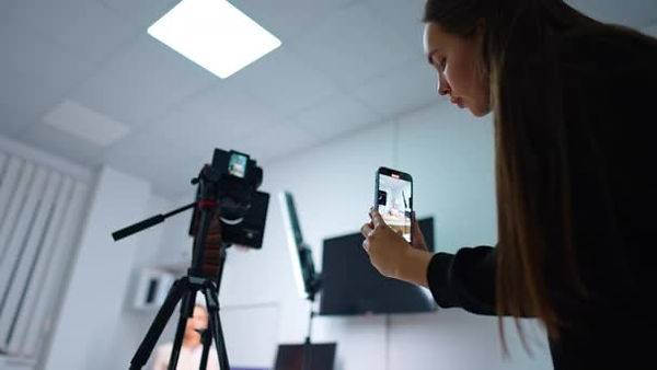 depositphotos_772572038-stock-video-female-blogger-taking-video-her.jpg