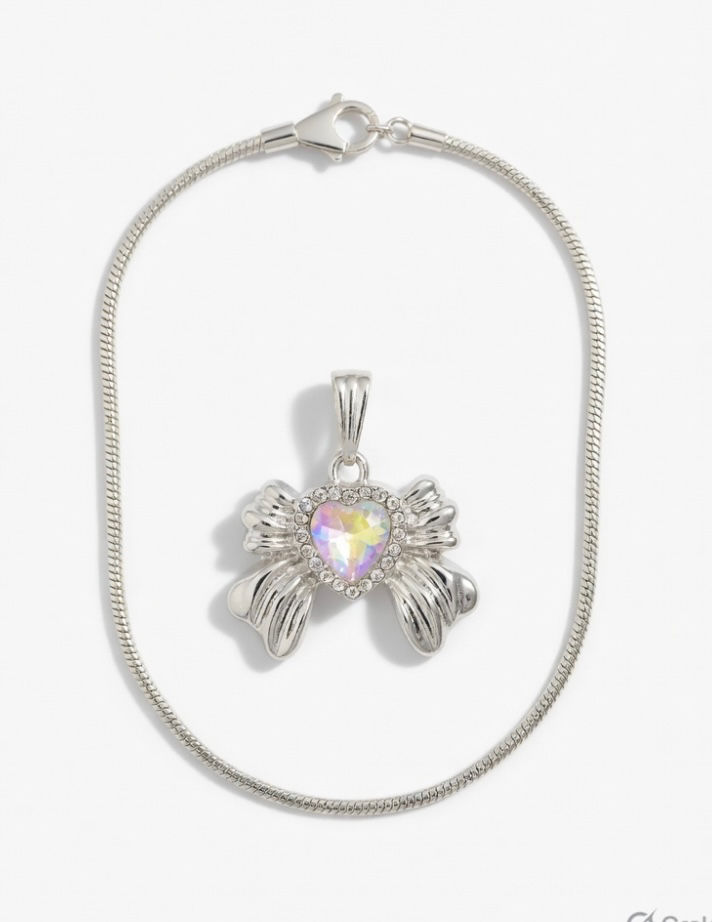 Silver bow with white heart gemstone necklace