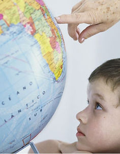 Social studies learning with globe for preschool children at Sonflower Early Learning in Everett WA