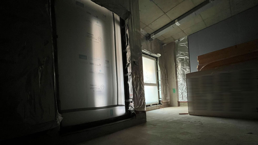 the difference between board blocking light on construction site and Protectapeel allowing natural light in