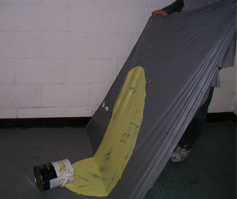 protective coating being peeled removing paint spillage