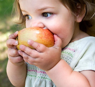 Child Eating Apple