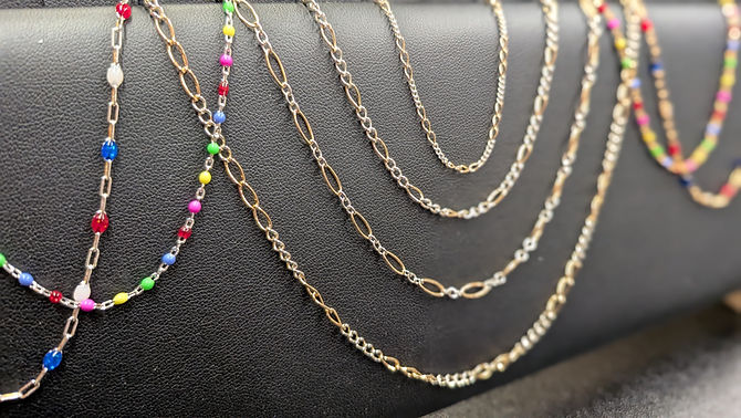 gold and silver colorful permanent jewelry chains.jpg