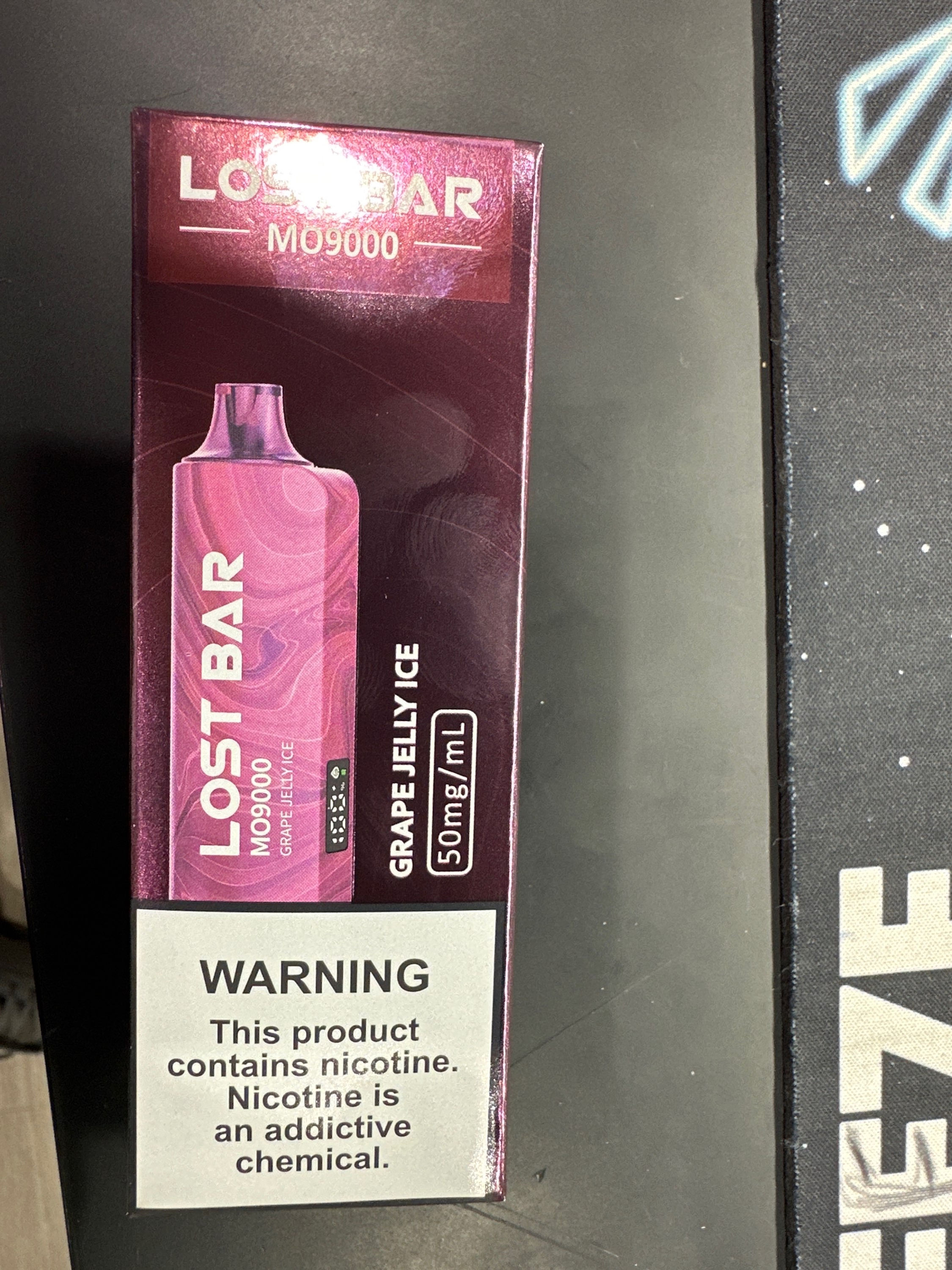 Lust bar, MO 9000 puffs grape jelly, ice
