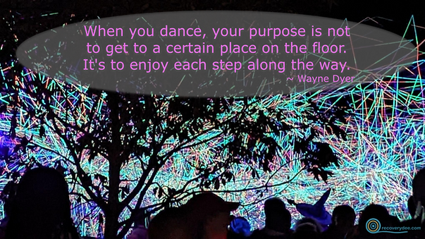 Quotepic Wayne Dyer on enjoying each step set against chaotic light display, at Blink in Washington Park Cincinnati